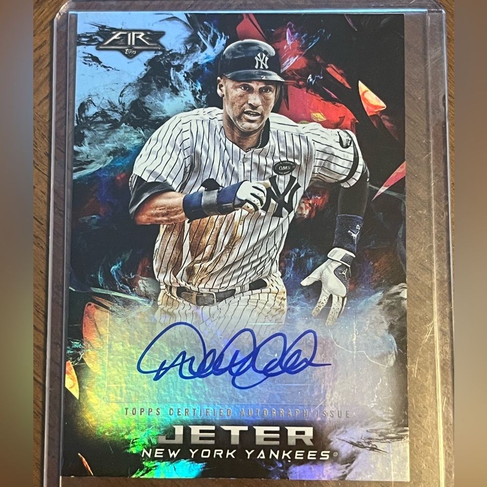 Derek Jeter signed baseball card. Topps 2018 authentic card.